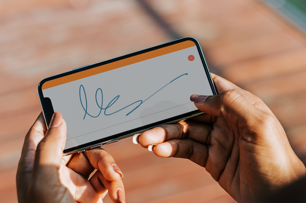 Captura de movil firma manos en TramitApp